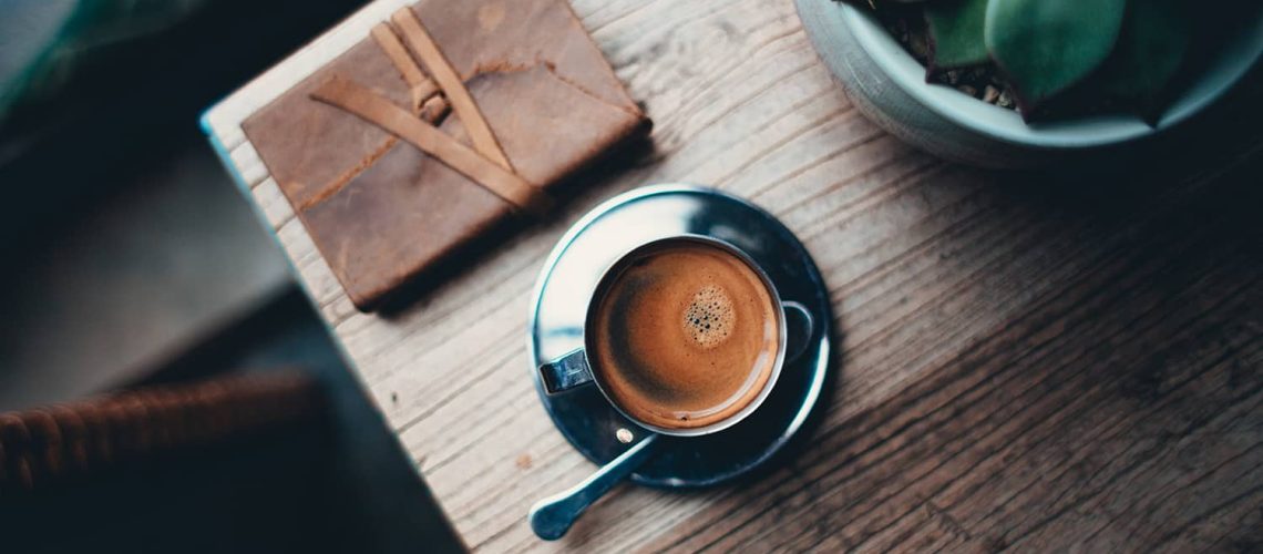 journal-and-coffee-at-table_4460x4460-1.jpg